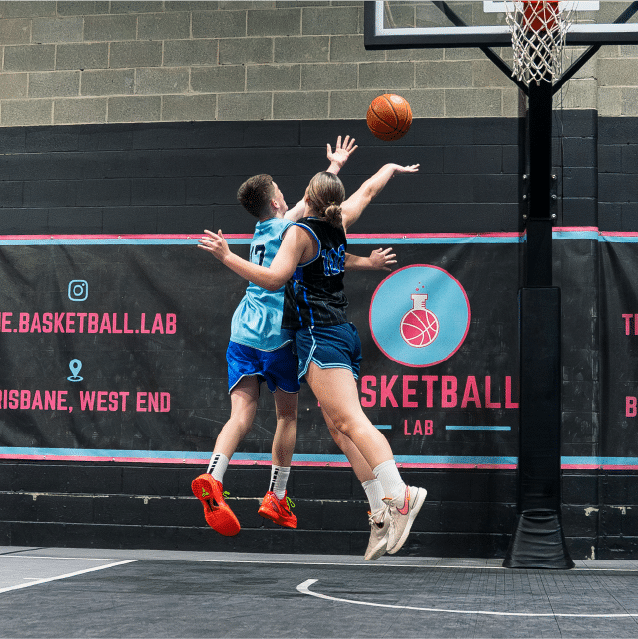 The two players are rebounding the ball.